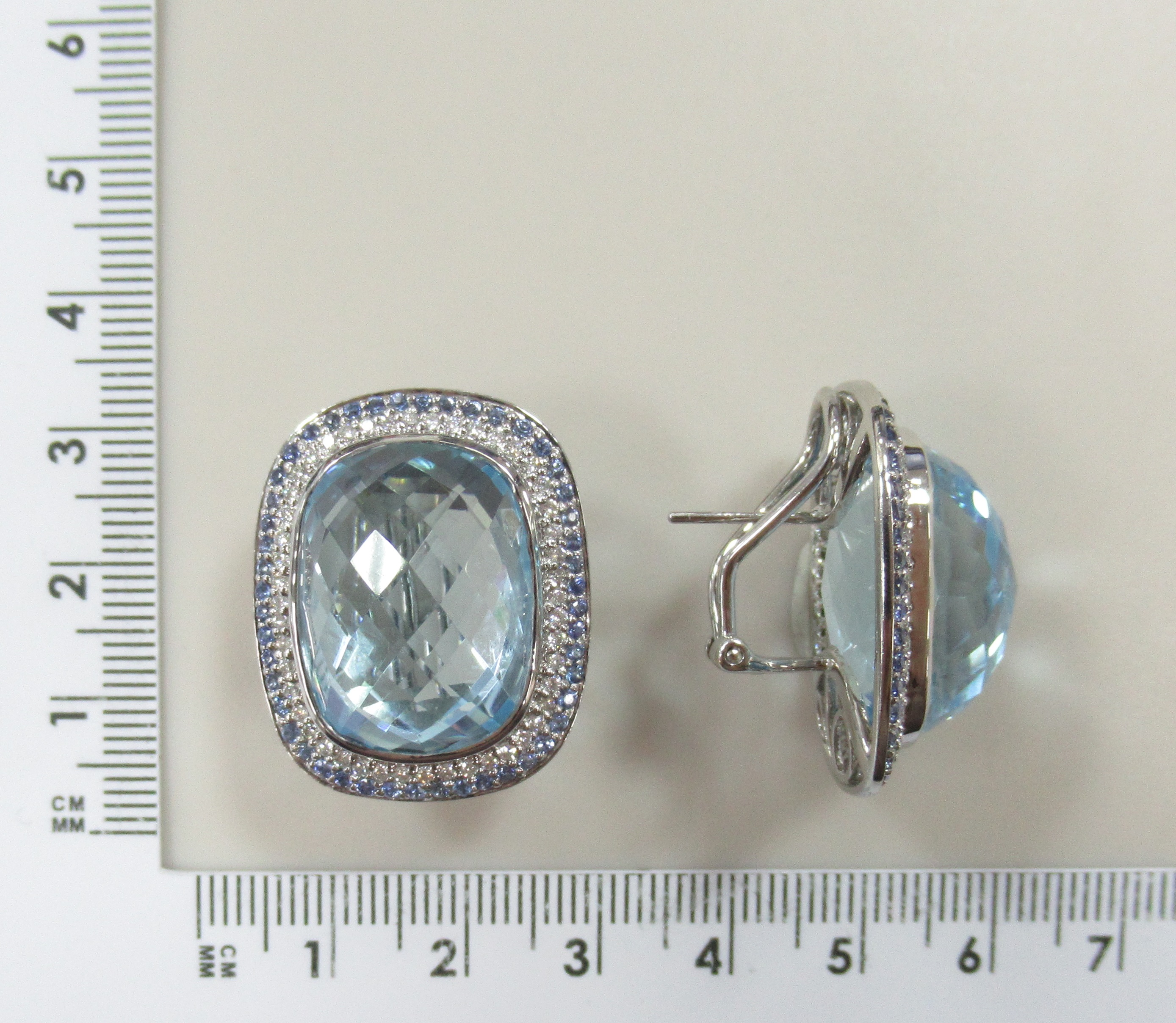 Серьги из белого золота с топазами